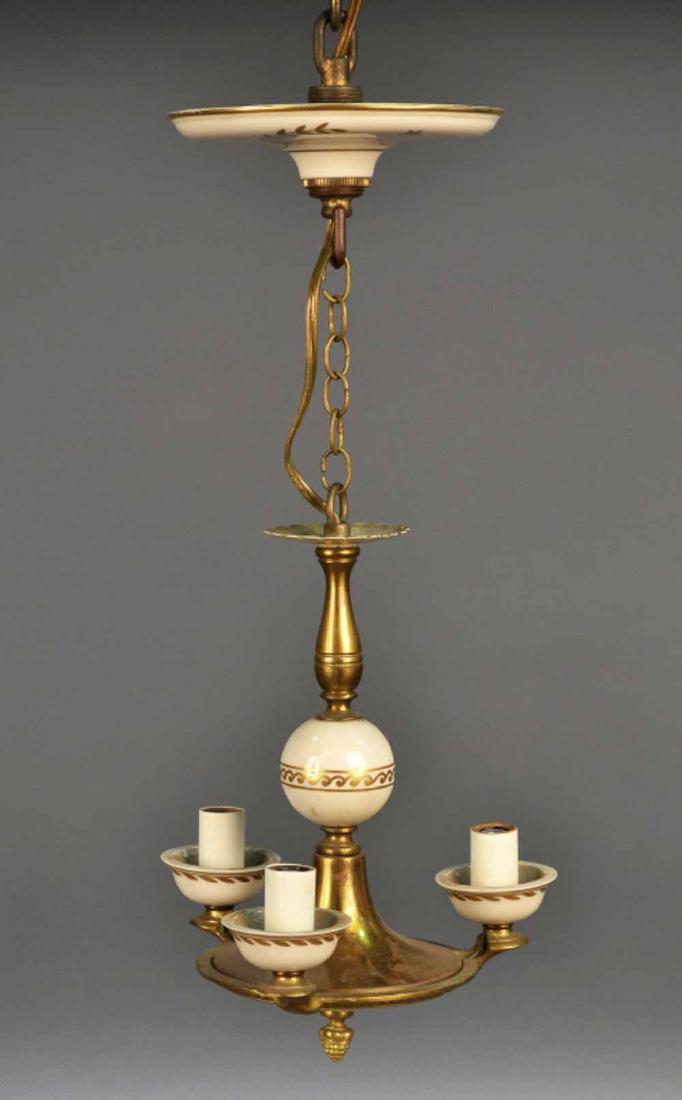 Lenox Three Light Porcelain Fixture: With Gold Accents. Height 10 inches, width 10 inches. Notice to bidders: Due to the nature of this particular online sale, the lots offered may not be available for detailed condition reports or addit