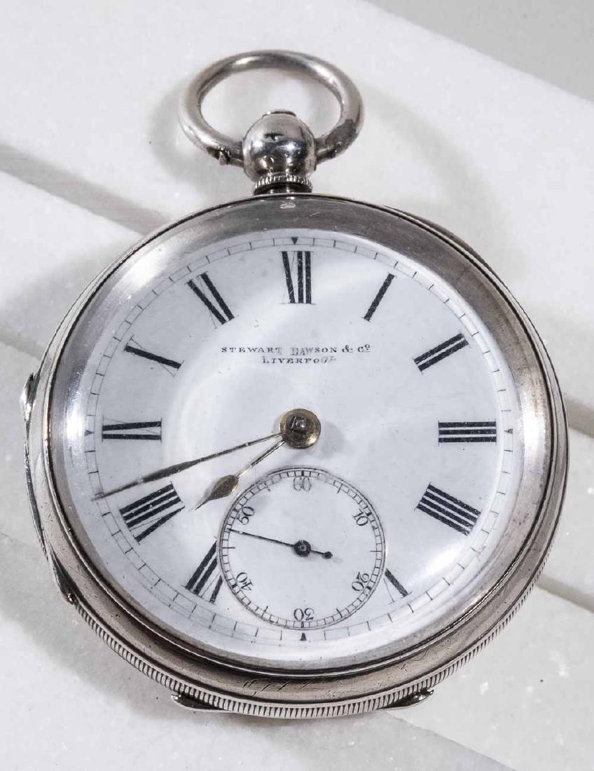 English Silver Key Wind Pocket Watch: Enamel dial with Roman numerals signed Stewart Dawson & Co. Liverpool, subsidiary seconds dial. 38mm. Notice to bidders: Condition reports and additional photographs are provided by request as a court