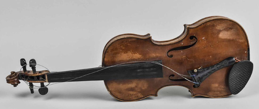 Hans Schirmer German Violin: One part back, branded mark inside Hans Schirmer / Germany / Adorf i.V.. Length of back, 14 1/8 inches. Notice to bidders: Condition reports and additional photographs are provided by request as a cou