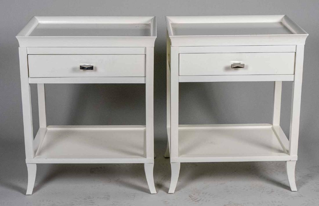 Pair of White Lacquered Night Tables: Rectangular tray top over a single drawer above a conforming lower shelf. Height 30 inches, width 24 inches, depth 18 inches. Notice to bidders: Due to the nature of this particular online sale, the l