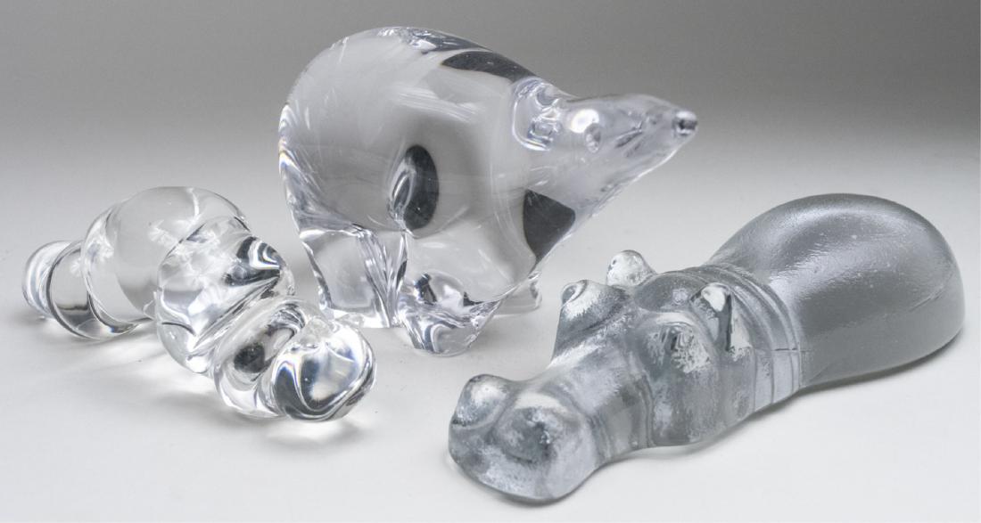 Three Crystal Animal Figurines: Unsigned hippopotamus and catepillar, together with an Orrefors polar bear. Polar bear, height 3 3/4 inches. Notice to bidders: Condition reports and additional photographs are provided by request as
