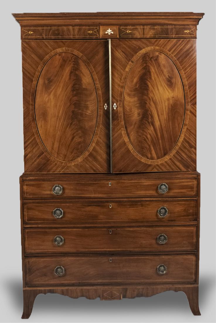 Mahogany Linen Press: Rectangular top with molded edge over two cabinet doors and four graduated drawers, modified for a television. Height 82 inches, width 42 inches, depth 22 inches. Notice to bidders: Condition reports