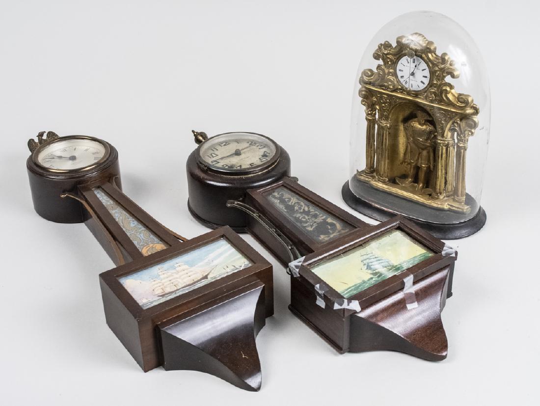 Clock Under Dome: Together with two bango style wall clocks. Height 10 inches. Notice to bidders: Condition reports and additional photographs are provided by request as a courtesy to our clients, as such any condition