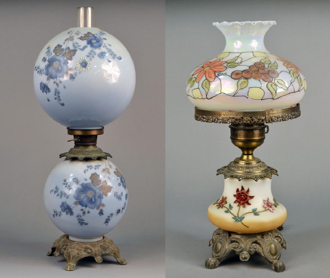 Two American Vintage Lamps: Late 19th century, converted from oil lamps. One, a Gone With the Wind lamp. height 29 inches; the other signed "Gina". Notice to bidders: Condition reports and additional photographs are provided by 