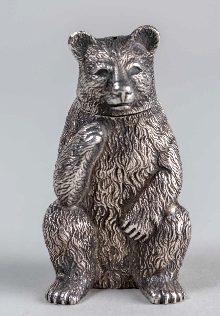 Buccellati Silver Bear *: Cast in seated position, signed. Height 3 inches. Notice to bidders: Condition reports and additional photographs are provided by request as a courtesy to our clients, as such any condition report is 