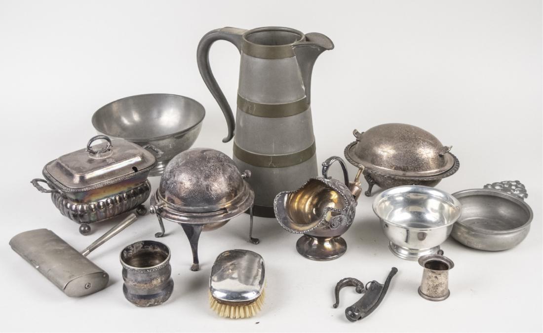 Group of Silver Plated and Metal Table Articles: Including a butter dish, two small covered entree dishes, a metal pitcher, pewter handled dish, etc. Notice to bidders: Condition reports and additional photographs are provided by request as a courte