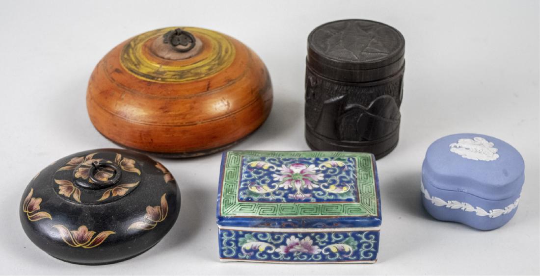 Group of Decorative Covered Boxes: Comprising two flattened globular boxes, a cylindrical box, a Chinese ceramic rectangular box and a Wedgwood blue jasper box. Largest, diameter 6 1/2 inches. Notice to bidders: Condition reports and a