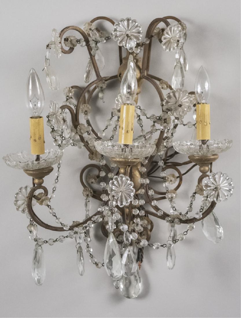 Beaded Wall Sconce: Three light sconce, with bead rope decoration. Height 18 inches. Notice to bidders: Condition reports and additional photographs are provided by request as a courtesy to our clients, as such any condi