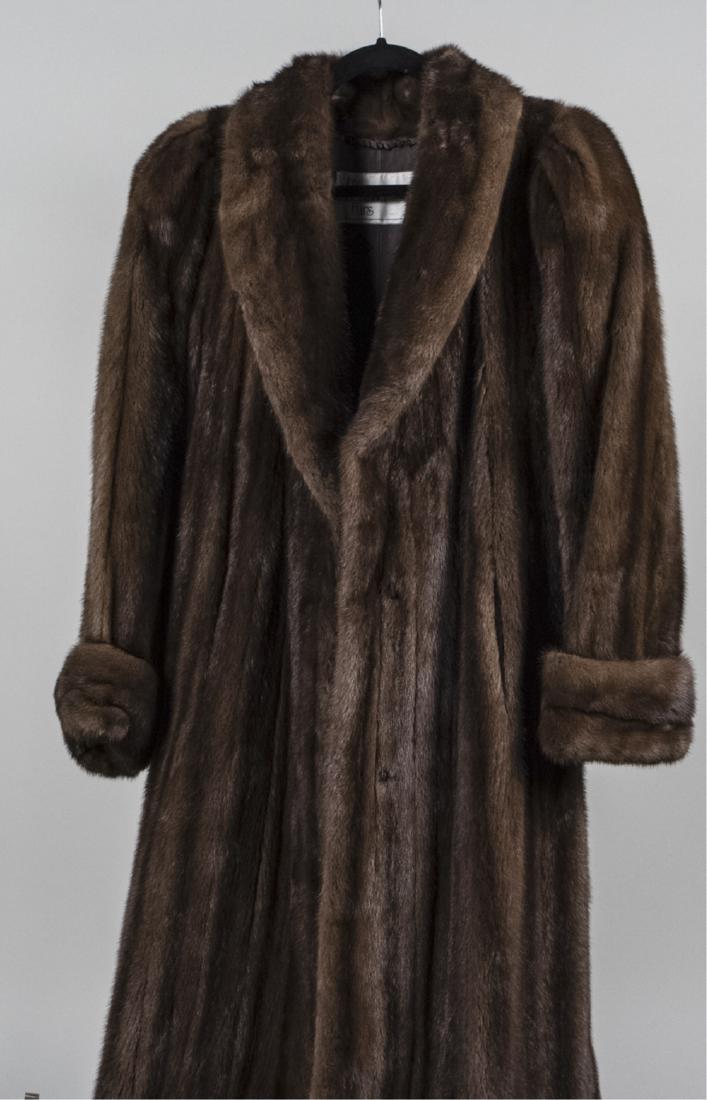 Ladys Mink Coat: Full length. Size Medium Notice to bidders: Condition reports and additional photographs are provided by request as a courtesy to our clients, as such any condition report is only an opinion and shoul