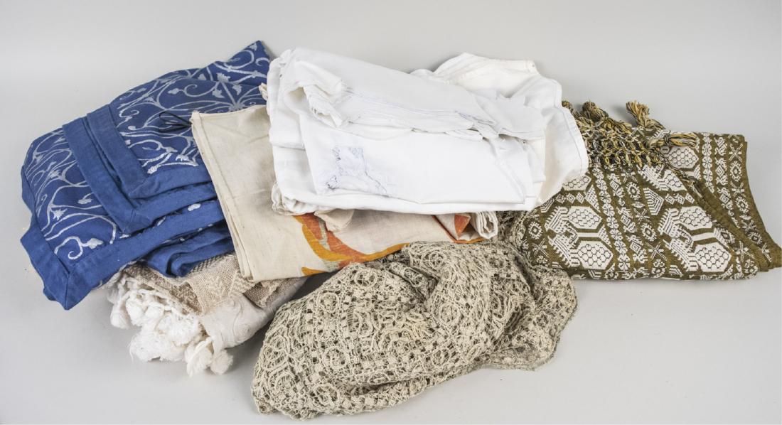 Group of Table Linens: Mostly table cloths and runners. Notice to bidders: Condition reports and additional photographs are provided by request as a courtesy to our clients, as such any condition report is only an opinion a