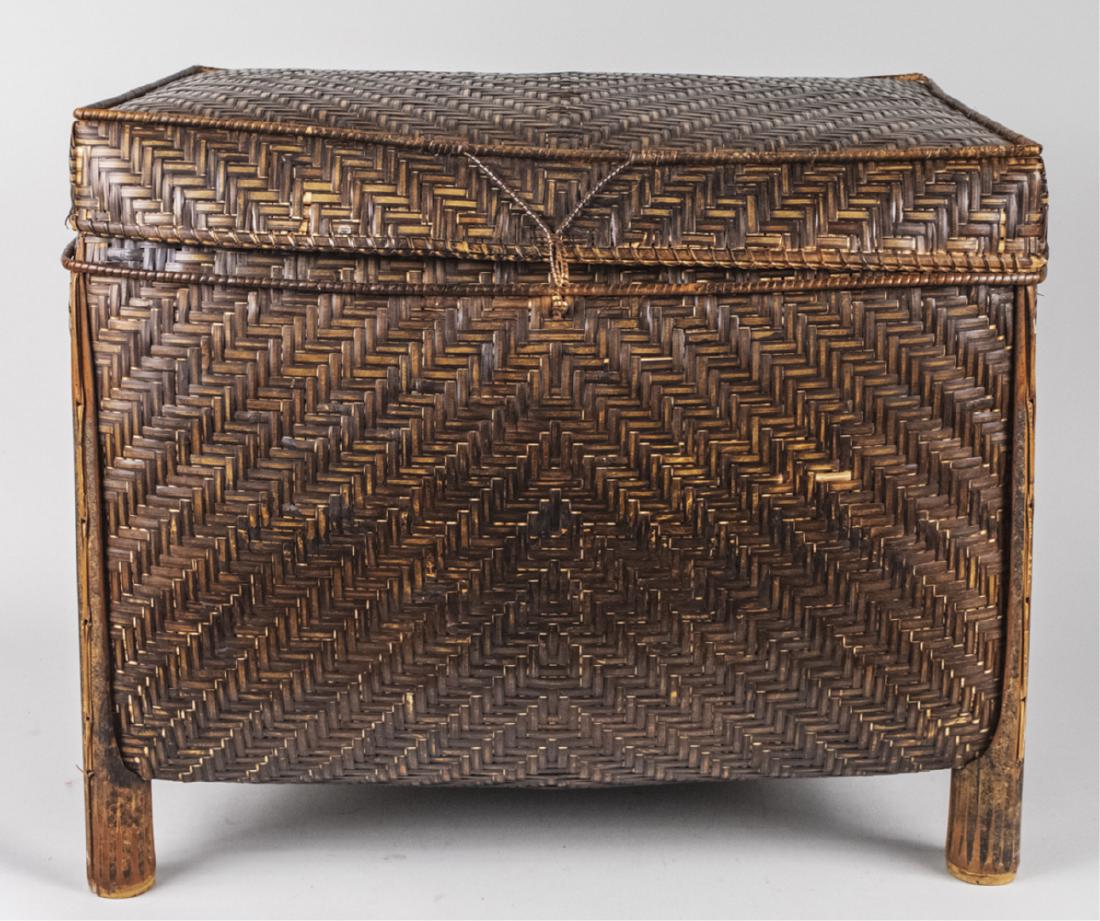 Woven Storage Chest: Lift top. Height 20 inches, width 26 inches, depth 18 inches. Notice to bidders: Condition reports and additional photographs are provided by request as a courtesy to our clients, as such any conditio