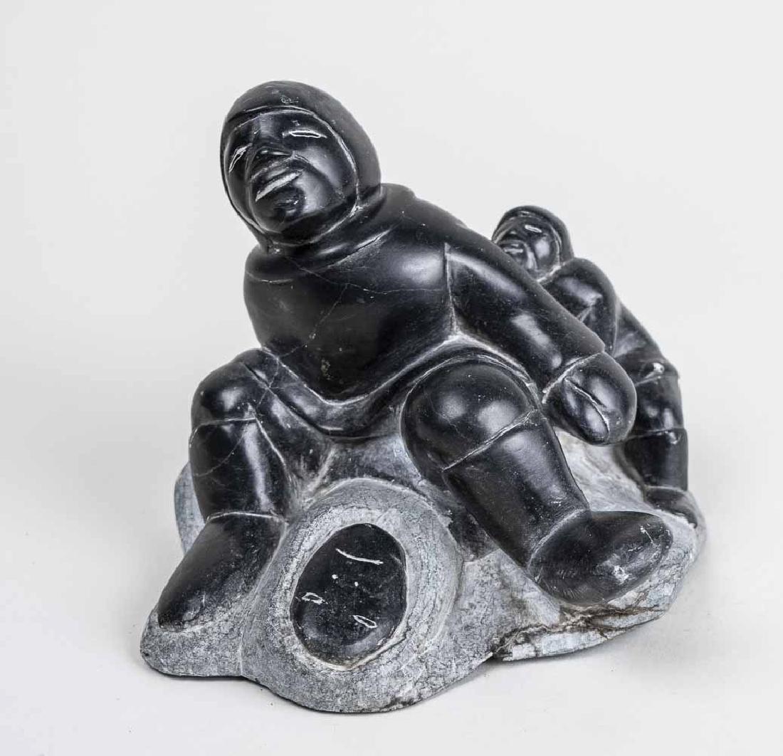 Inuit Carved Stone Sculpture: Large and small figure. Height, 5 inches. Length, 7 inches. Notice to bidders: Condition reports and additional photographs are provided by request as a courtesy to our clients, as such any condition 