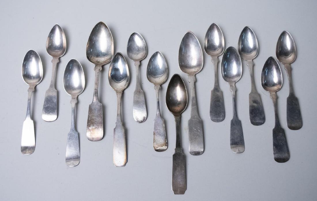 Group of Coin Silver Teaspoons: Various makers, most fiddle pattern. Total 256 grams. Notice to bidders: Due to the nature of this particular online sale, the lots offered may not be available for detailed condition reports or addit