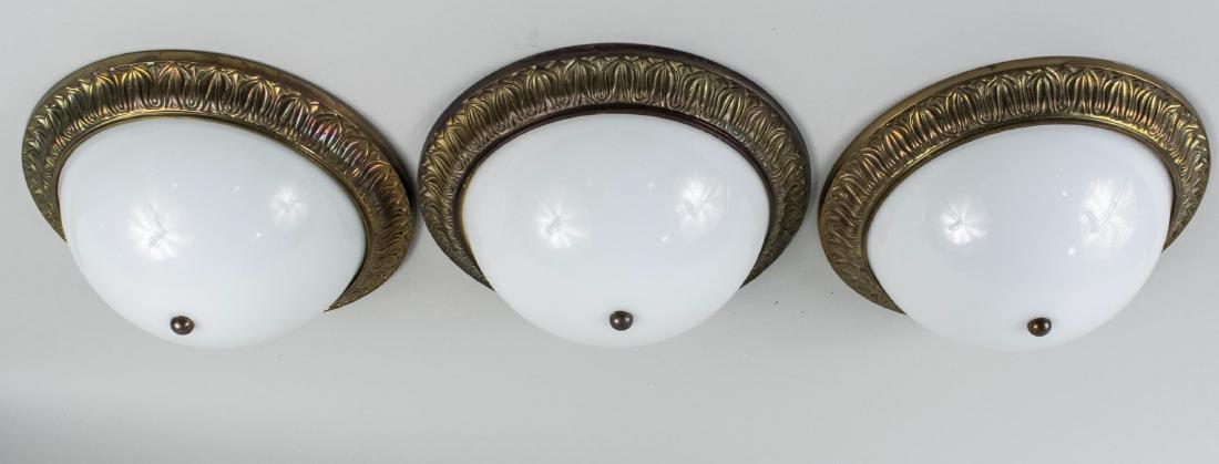 Urban Archeology Bronze Rim Ceiling Lights: Three inverted dome shades. Notice to bidders: Due to the nature of this particular online sale, the lots offered may not be available for detailed condition reports or additional photography. The abs