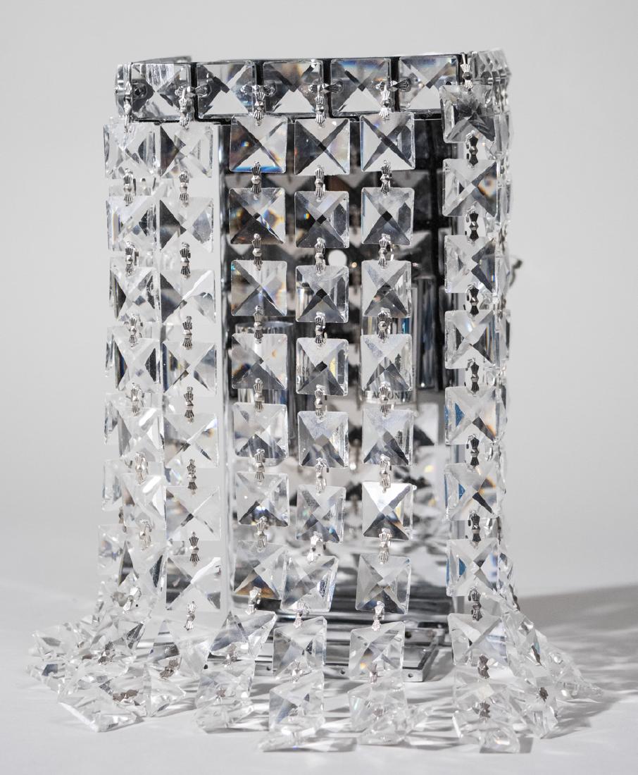 Pair of Crystal Sconces: Square bead ropes and faceted ball decoration. Height 12 inches. Notice to bidders: Condition reports and additional photographs are provided by request as a courtesy to our clients, as such any condi
