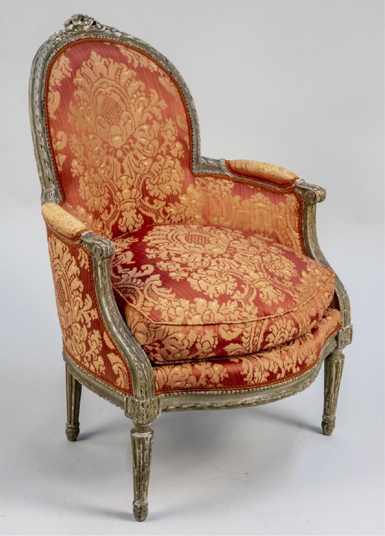 Louis XVI Painted Bergere: Rust coloured damask upholstery. Notice to bidders: Condition reports and additional photographs are provided by request as a courtesy to our clients, as such any condition report is only an opinion a