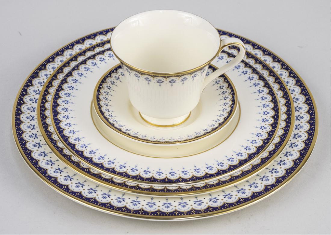 Mintons Porcelain Dinner Services: Approximately forty five pieces, Consort pattern, comprising eight dinner plates, eight salad plates, eight bread plates, eight cups, eight saucers, two demitasse cups, two demitasse saucers, a creame