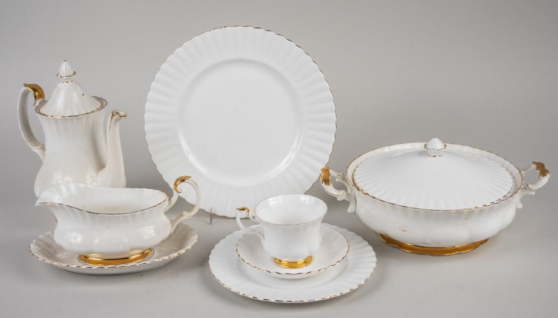 Royal Albert Porcelain Dinner Service: Approximately fifty four pieces, Val DOr pattern, comprising six dinner plates, twelve salad plates, six bread plates, four teacups and six saucers, six coffee cups and six saucers, oval platter, thre