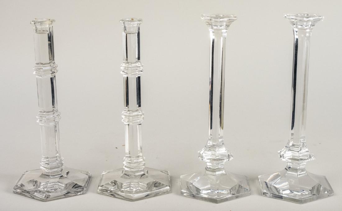 Two Pairs of Colourless Candlesticks: One pair, signed Val St. Lambert, the other marked TIffany & Co. Taller, pair, height 11 1/2 inches. Notice to bidders: Condition reports and additional photographs are provided by request as a courte