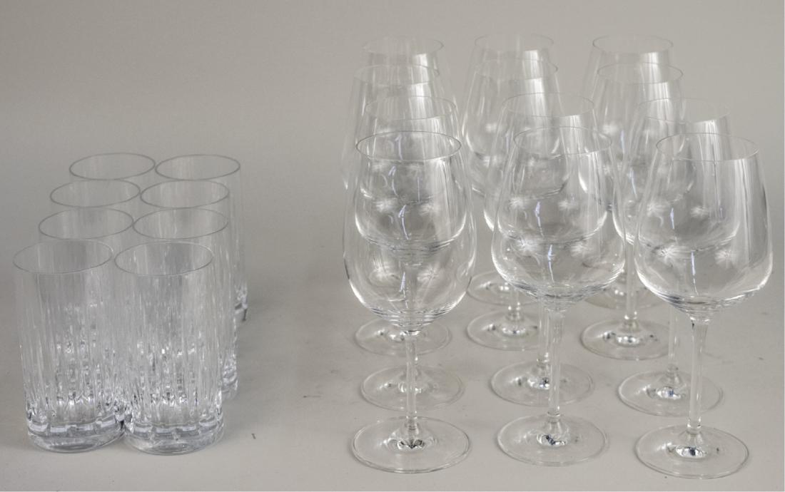 Set of Stemware: Fifteen colourless wine glasses. Height 8 7/8 inches. Notice to bidders: Due to the nature of this particular online sale, the lots offered may not be available for detailed condition reports or addit