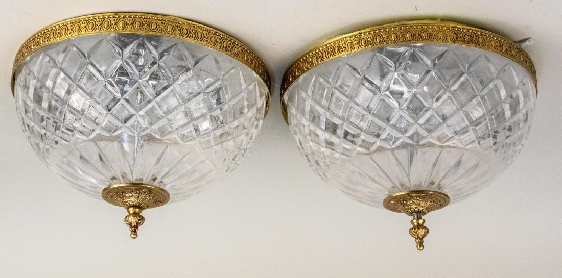 Pair of Cut Glass Style Ceiling Lights: Circular inverted dome lights with brass trim. Diameter 12 inches. Notice to bidders: Due to the nature of this particular online sale, the lots offered may not be available for detailed condition rep