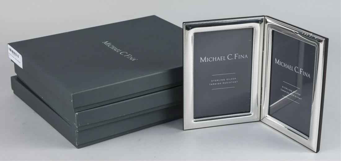 Set of Three Michael C Fina Silver Picture Frames: Lexington pattern, three double 4 x 6 frames. Notice to bidders: Due to the nature of this particular online sale, the lots offered may not be available for detailed condition reports or additional ph
