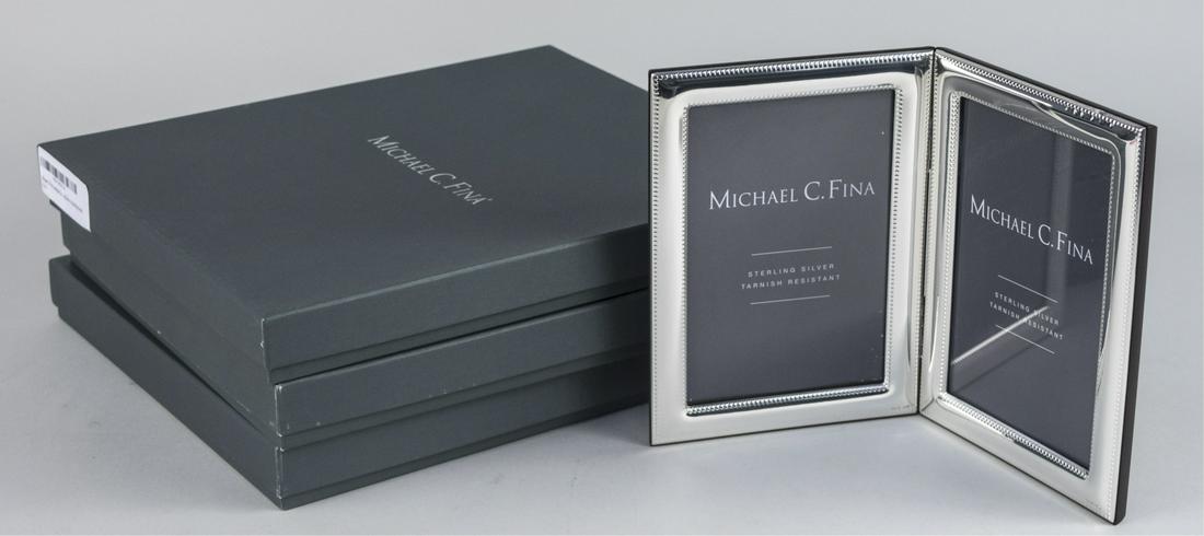 Set of Three Michael C Fina Silver Picture Frames: Lexington pattern, three double 4 x 6 frames. Notice to bidders: Due to the nature of this particular online sale, the lots offered may not be available for detailed condition reports or additional ph