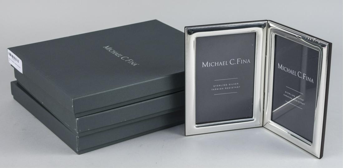 Set of Three Michael C Fina Silver Picture Frames: Lexington pattern, three double 4 x 6 frames. Notice to bidders: Due to the nature of this particular online sale, the lots offered may not be available for detailed condition reports or additional ph