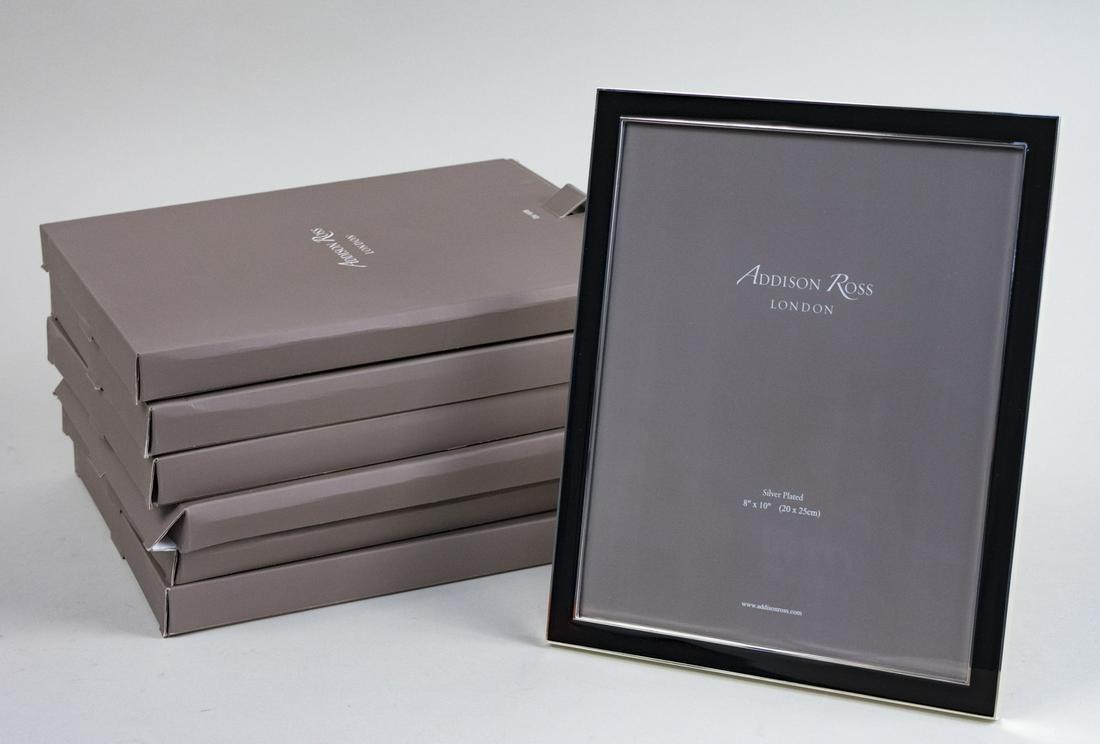 Six Addison Ross Black Enamel Picture Frames: Each hold an 8 x 10 photo, in original boxes. Notice to bidders: Due to the nature of this particular online sale, the lots offered may not be available for detailed condition reports or additional ph