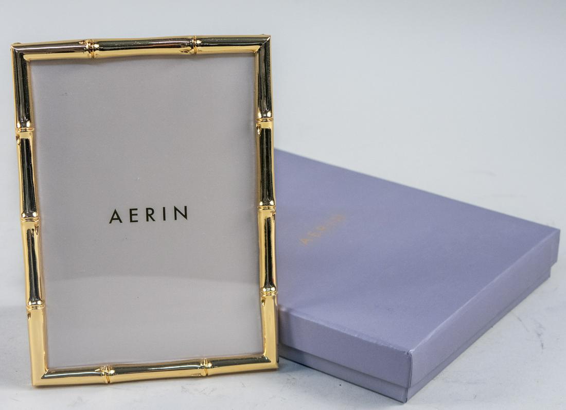 Aerin Mayonette Bamboo Picture Frame: Holds a 5 x 7 photograph, in original box. Notice to bidders: Due to the nature of this particular online sale, the lots offered may not be available for detailed condition reports or additional photo
