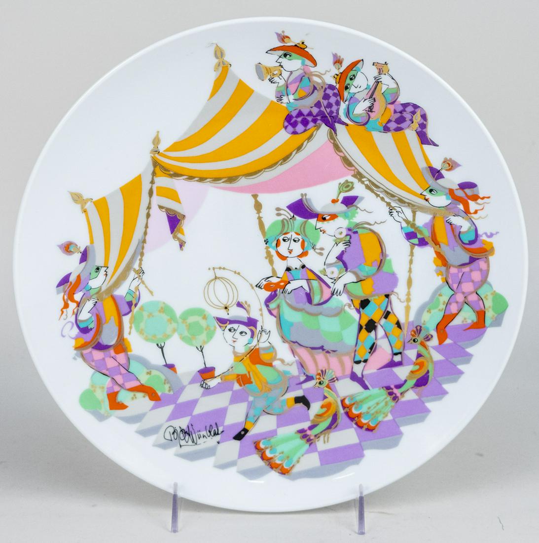 Bjorn Wiinblad for Rosenthal Porcelain Charger: Studio - linie, Commedia dell arte, signed, l.l. Diameter 13 inches. Notice to bidders: Due to the nature of this particular online sale, the lots offered may not be available for detailed condition r