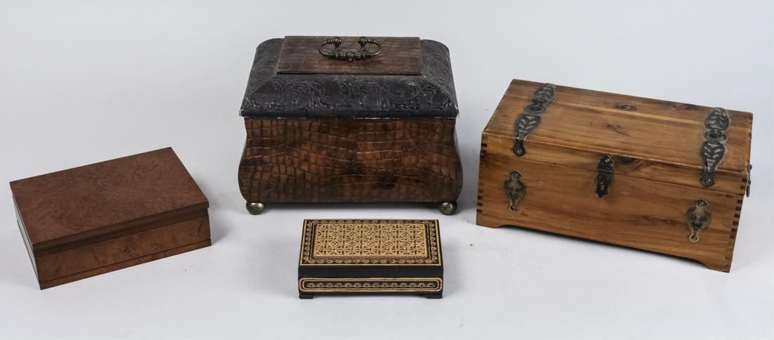 Four Decorative Boxes: Various styles. Largest, 7 1/2 inches, width11 inches, depth 8 1/2 inches. Notice to bidders: Due to the nature of this particular online sale, the lots offered may not be available for detailed condi
