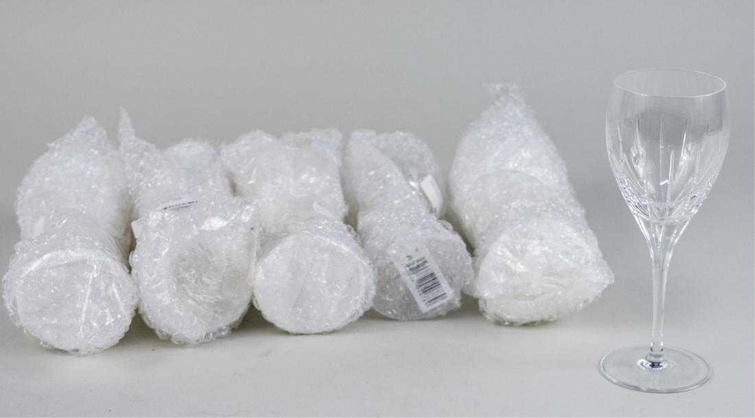 Set of SIx Christofle Iriana White Wine Glasses: Height 6 3/4 inches. Notice to bidders: Due to the nature of this particular online sale, the lots offered may not be available for detailed condition reports or additional photography. The absence of