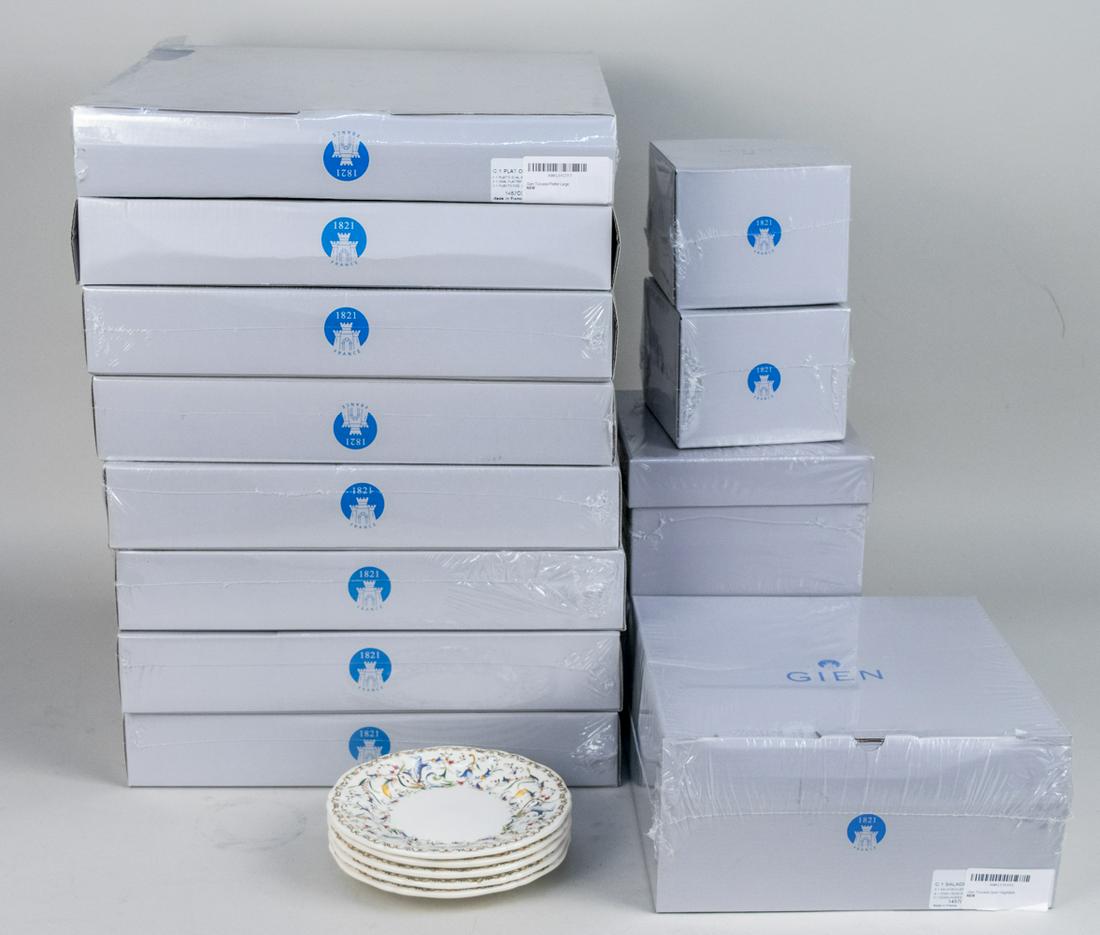 Group Gien Toscana Table Articles: Thirty nine pieces, comprising seven round deep dishes, a platter, two sugar bowls, an open vegetable dish, twenty canape plates and four teacups and saucers. Deep dish, diameter 12 1/4 inches. Notice