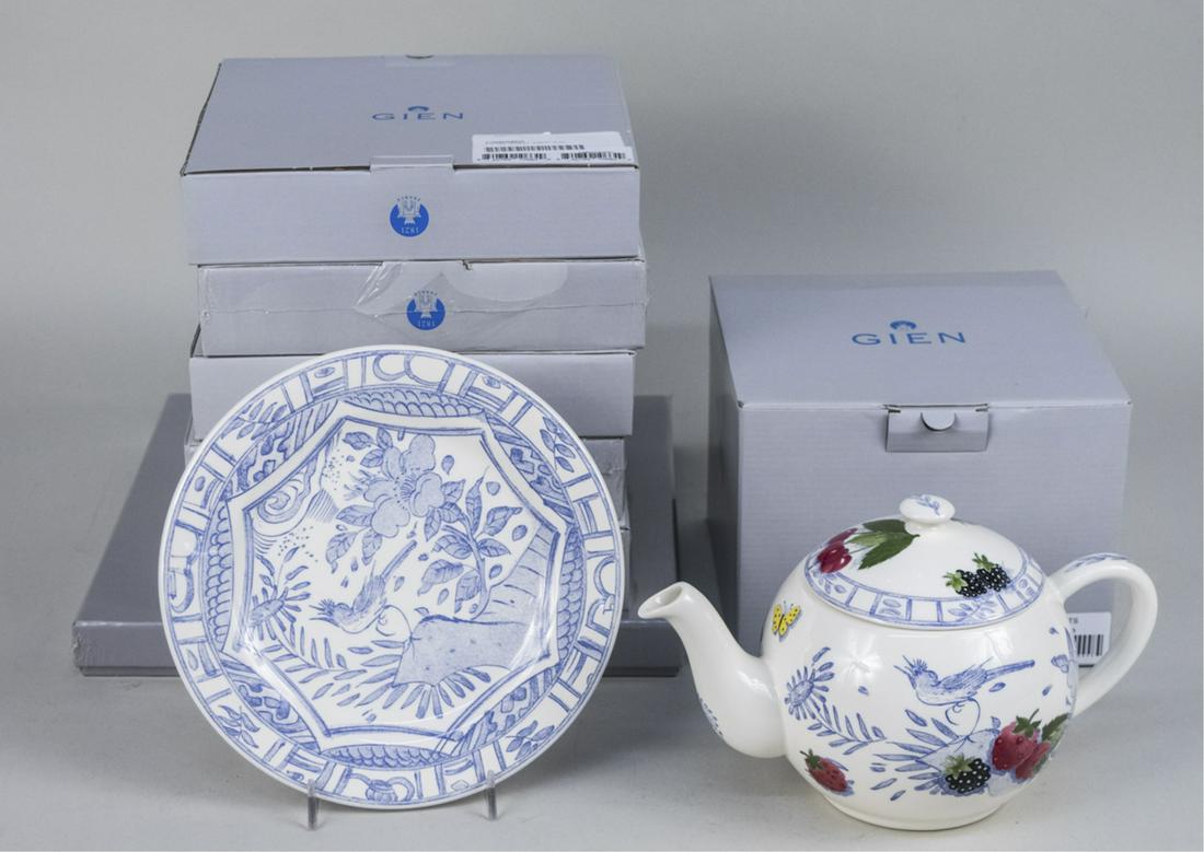 Gien Oiseau Blue Dessert Service: Thirty pieces, comprising twenty eight dessert plates with matching teapot and cake serving plate. Dessert plate diameter 8 3/4 inches. Notice to bidders: Due to the nature of this particular online s