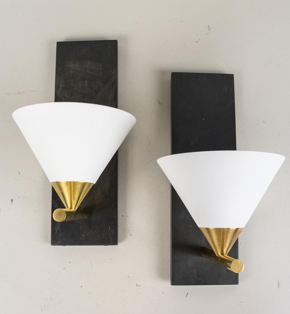Pair of Contemporary Sconces: Single light, white painted and parcel gilt shades. Notice to bidders: Due to the nature of this particular online sale, the lots offered may not be available for detailed condition reports or additio