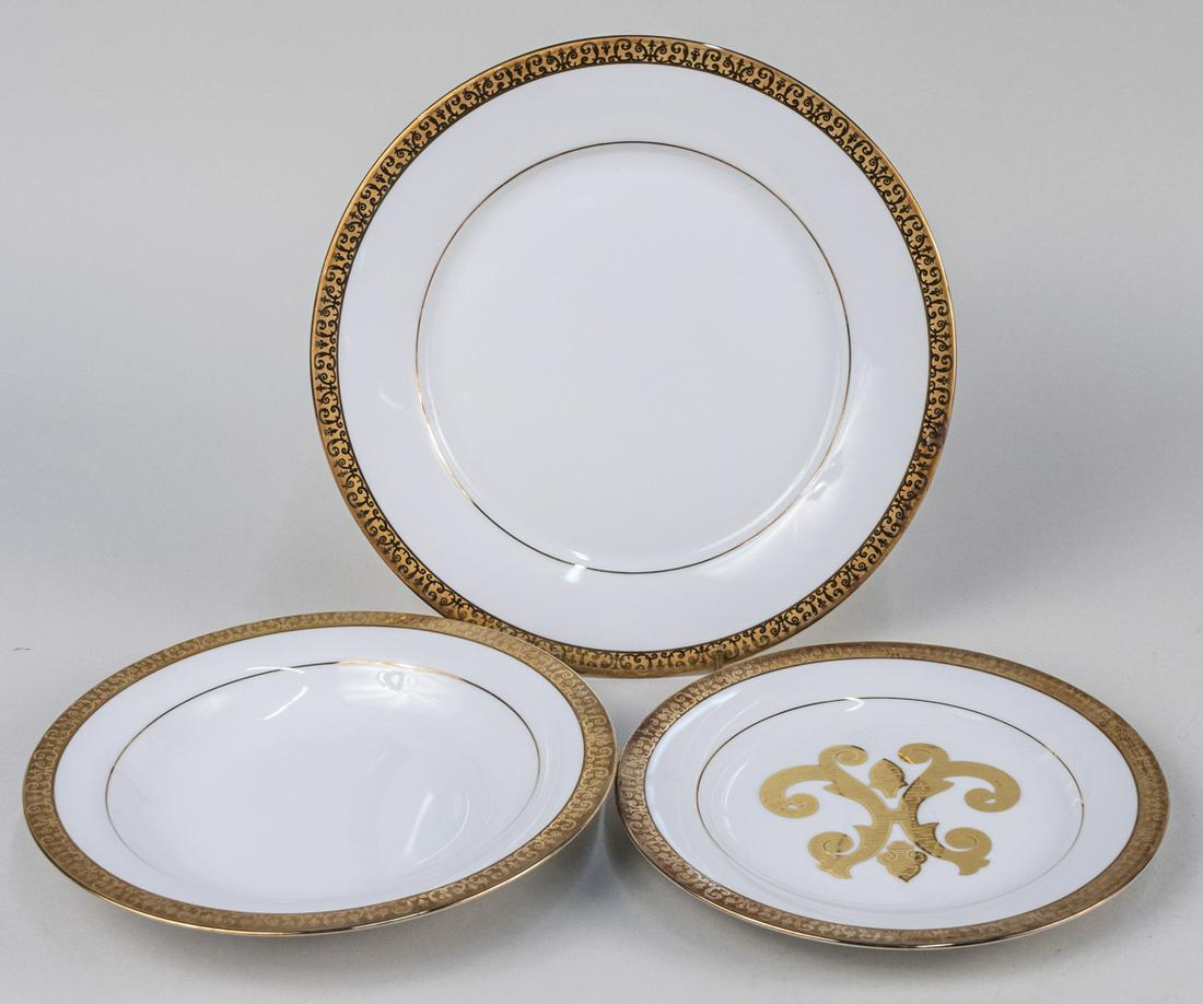 Gilt Rimmed Porcelain Dinner Service: Approximately eighty five pieces, comprising thirty four dinner plates, thirty six salad plates, sixteen bowls. Dinner plate diameter 10 3/4 inches. Notice to bidders: Due to the nature of this partic