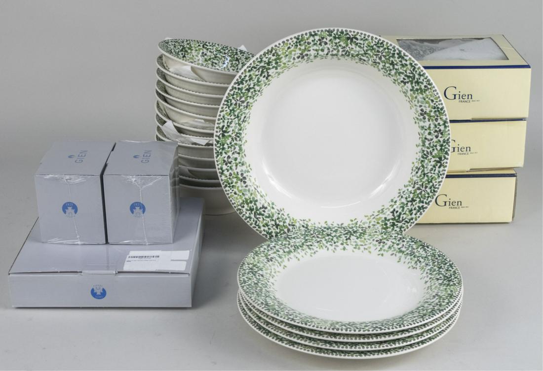 Gien Songe Partial Dinner Service: Thirty one pieces, comprising four dinner plates, twelve cereal bowls, twelve canape plates, two mugs and a round deep dish. Dish, diameter 12 1/4 inches. Notice to bidders: Due to the nature of this