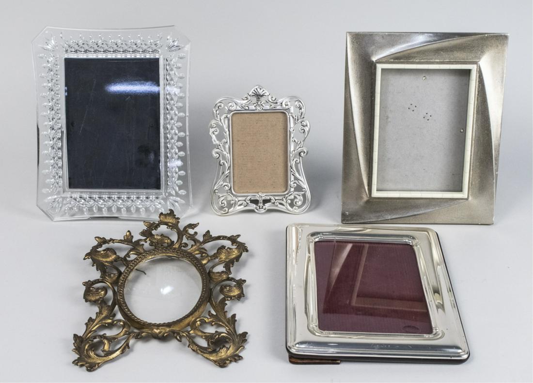 Group of Picture Frames: Various styles. Largest, hold 5 x 7 photograph. Notice to bidders: Due to the nature of this particular online sale, the lots offered may not be available for detailed condition reports or additional