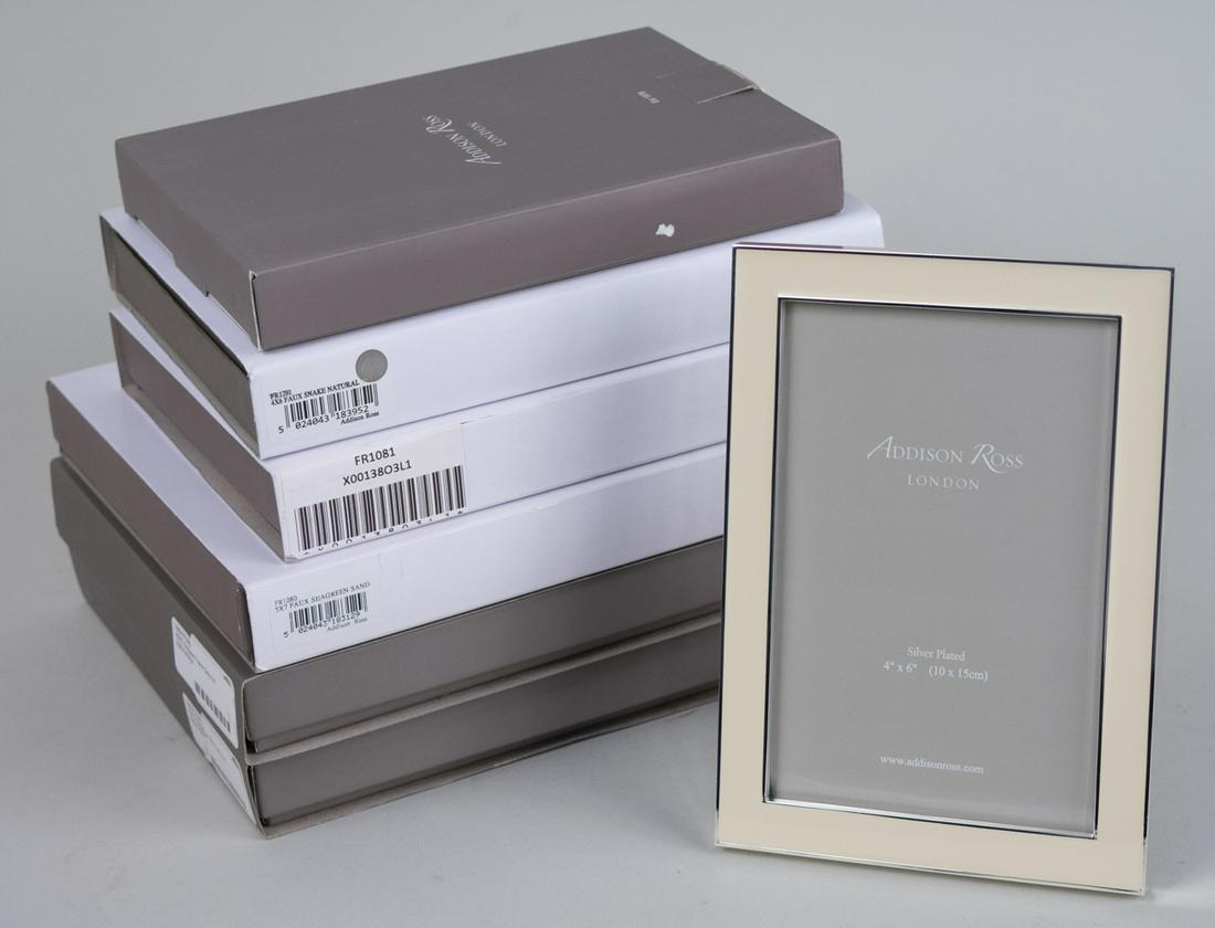 Group of Six Addison Ross Picture Frames: Including one vanilla enamel 4 x 6 frame, one faux snakeskin 4 x 6 frame, one sand shagreen 4 x 6 frame, one sand shagreen 5 x 7 frame, and two grey shagreen 5 x 7 frames, in original boxes. Notice to