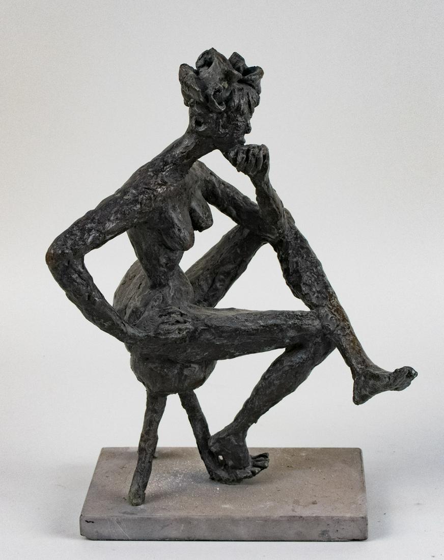 Bronze Sculpture Woman: Depicting a nude female, modeled seated, stone base. height 14 1/4 inches. Notice to bidders: Condition reports and additional photographs are provided by request as a courtesy to our clients, as such