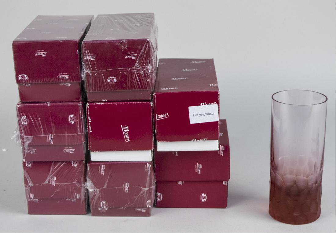 Group of Moser Pebbles Barware: Nine pieces, Pebbles pattern, comprising one aquamarine double old fashioned glass, three aquamarine highball glasses, and five rose highball glasses, most in original boxes. Notice to bidders: Condit