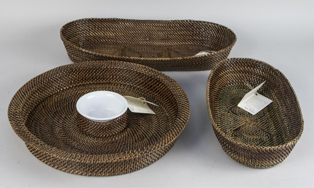 Group of Calaisio Wicker Table Decorations: Including two oval baskets and a round serving tray. Tray, diameter 15 1/2 inches. Notice to bidders: Condition reports and additional photographs are provided by request as a courtesy to our clients,