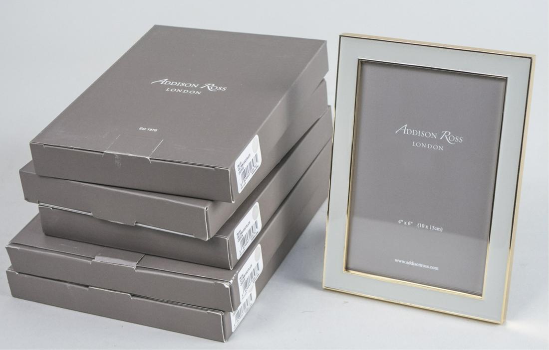 Five Addison Ross Gold Chiffon Picture Frames: Including three 4 x 6 frames and two 5 x 7 frames, in original boxes. Notice to bidders: Condition reports and additional photographs are provided by request as a courtesy to our clients, as such any 