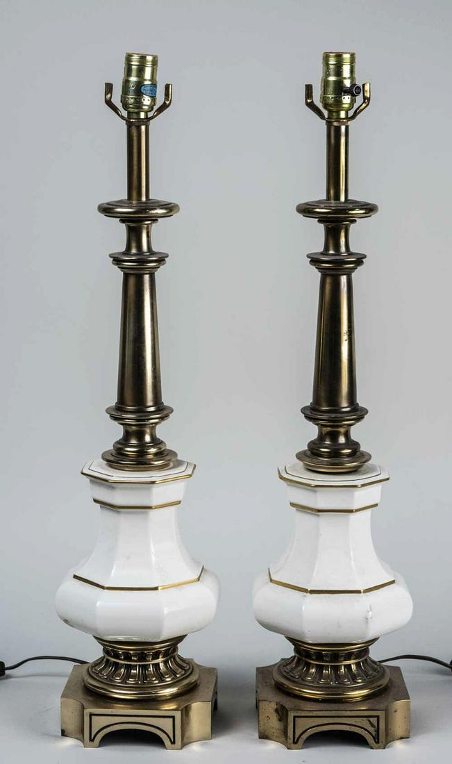 Pair of Stiffel Lenox Porcelain Table Lamps: Single light lamps with white porcelain bases with gilt highlights. Overall height 27 inches. Notice to bidders: Condition reports and additional photographs are provided by request as a courtesy to o