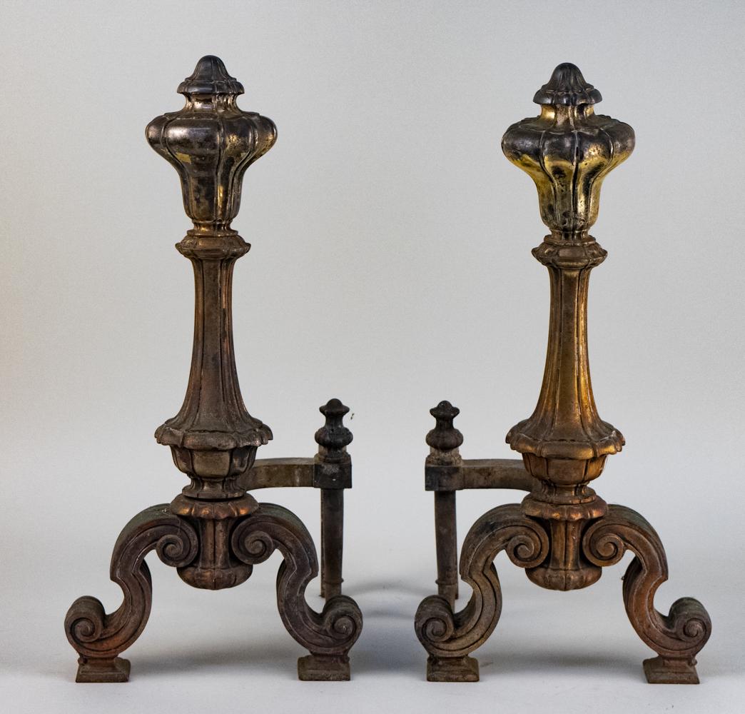 Pair of Brass Andirons: Neoclassical style. Height 21 inches. Notice to bidders: Due to the nature of this particular online sale, the lots offered may not be available for detailed condition reports or additional photograph