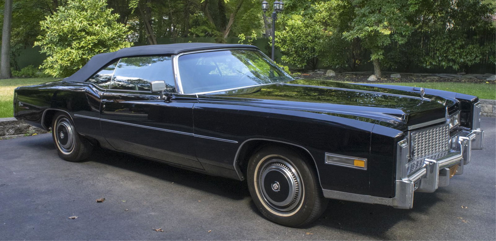 1976 Cadillac Eldorado Convertible: Black exterior and black interior, fuel injected. 42474 miles. Notice to bidders: Condition reports and additional photographs are provided by request as a courtesy to our clients, as such any conditi