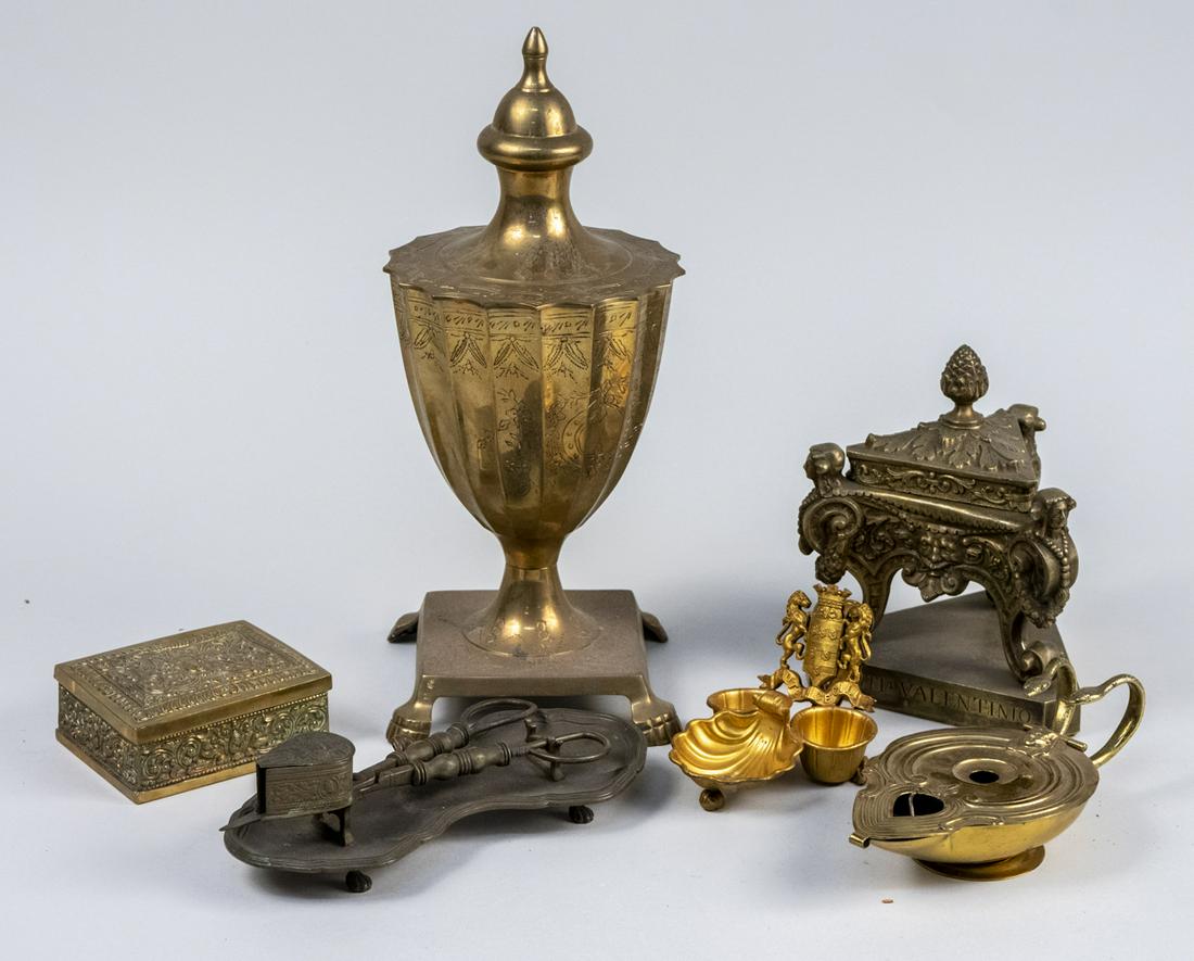 Group of Brass Table Decorations: Details coming soon Notice to bidders: Due to the nature of this particular online sale, the lots offered may not be available for detailed condition reports or additional photography. The absence of 