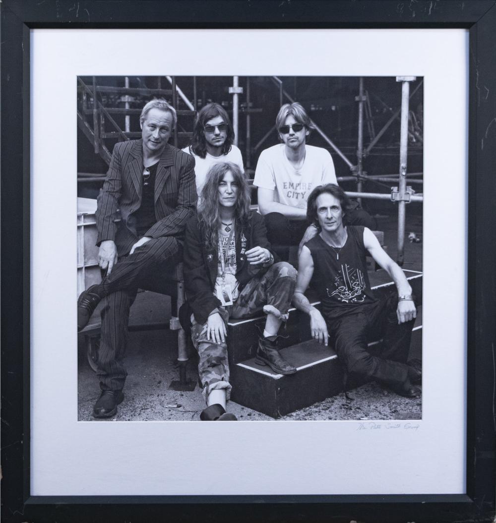 Melodie McDaniel (American, b. 1967): Patti Smith Band. Cover photograph for Trampin Aux Viellies Charrues, 2004. Photographic print. Sight size, 23 1/2 x 23 1/2 inches. Matted and framed. Notice to bidders: Due to the nature of this part