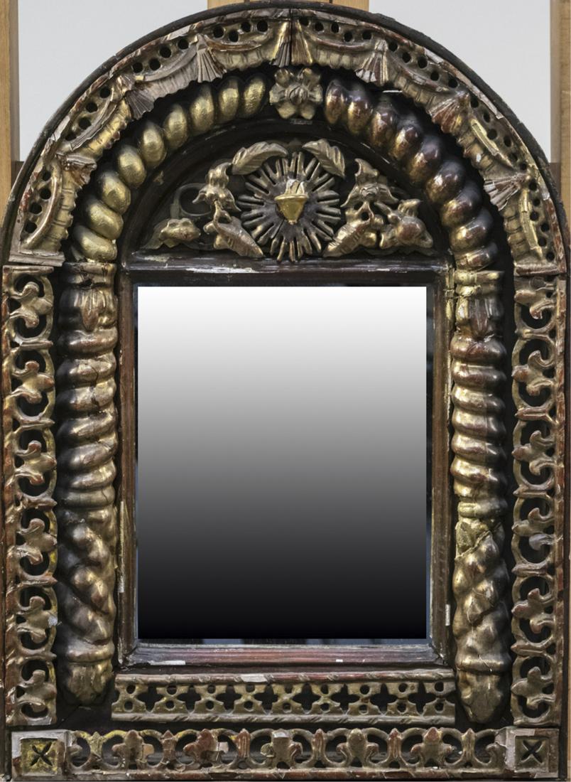 Antique Gilt Wood Mirror: Arched top carved mirror, with pierced design border. Height 26 inches, width 19 inches. Notice to bidders: Condition reports and additional photographs are provided by request as a courtesy to our cl